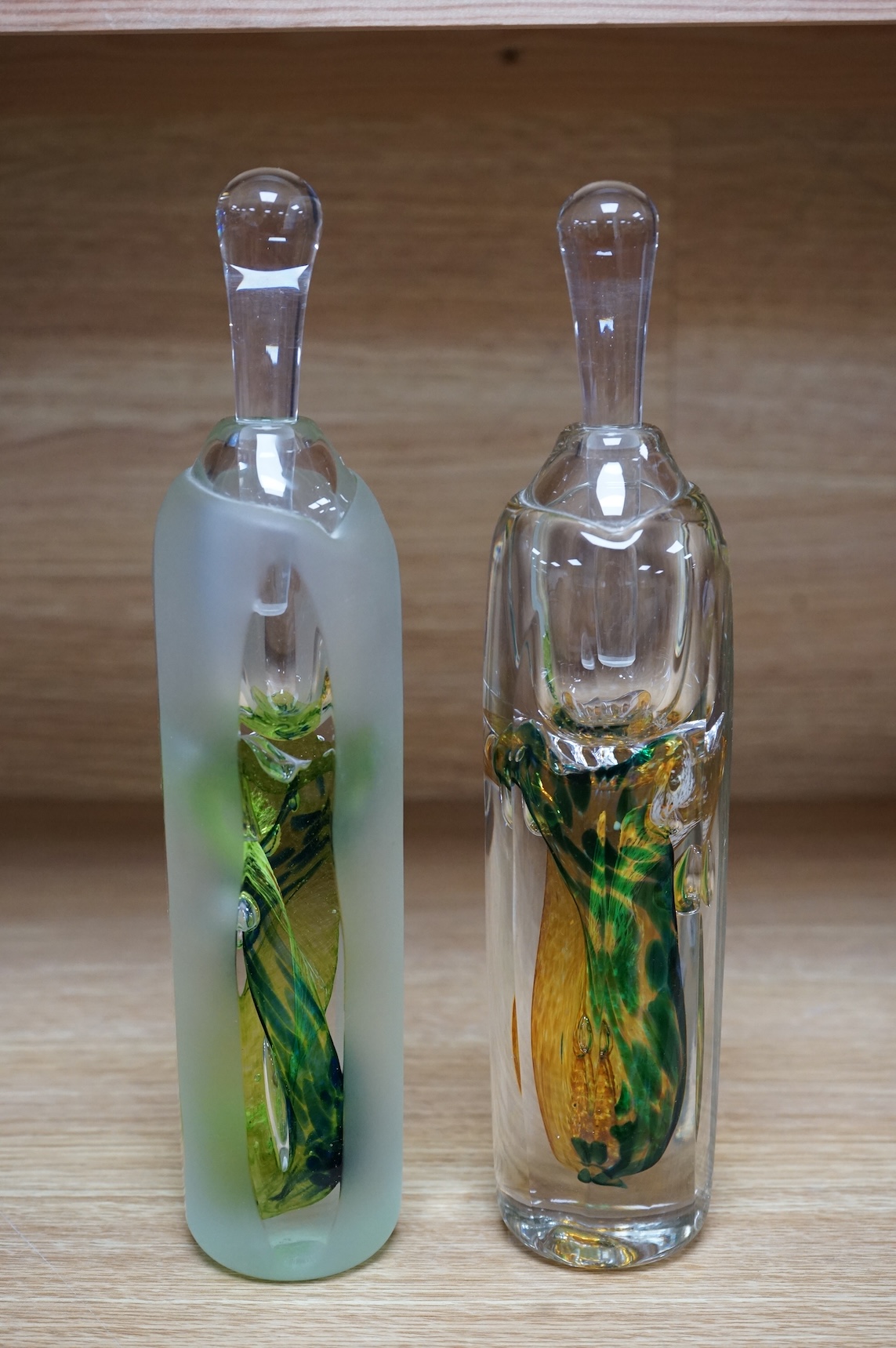Jane Charles, two oversized art glass scent bottles and stoppers, signed to the bases, 29cm high